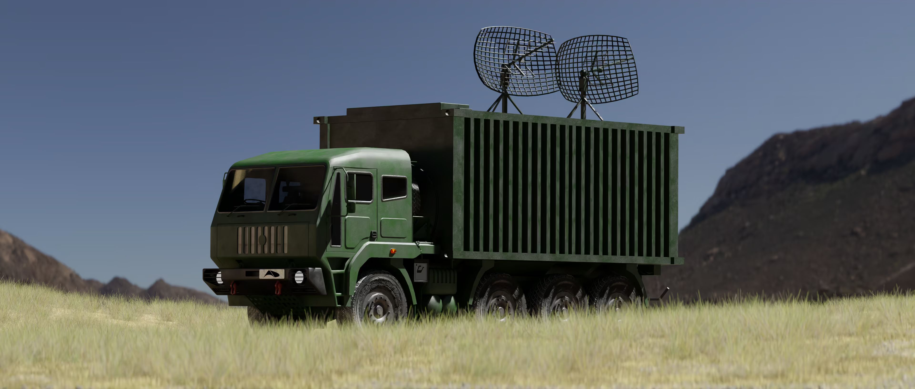 MDCC shelter body and dish antennas on an 8x8 chassis in a grassy field